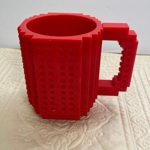 Build on brick red mug holds 12 oz